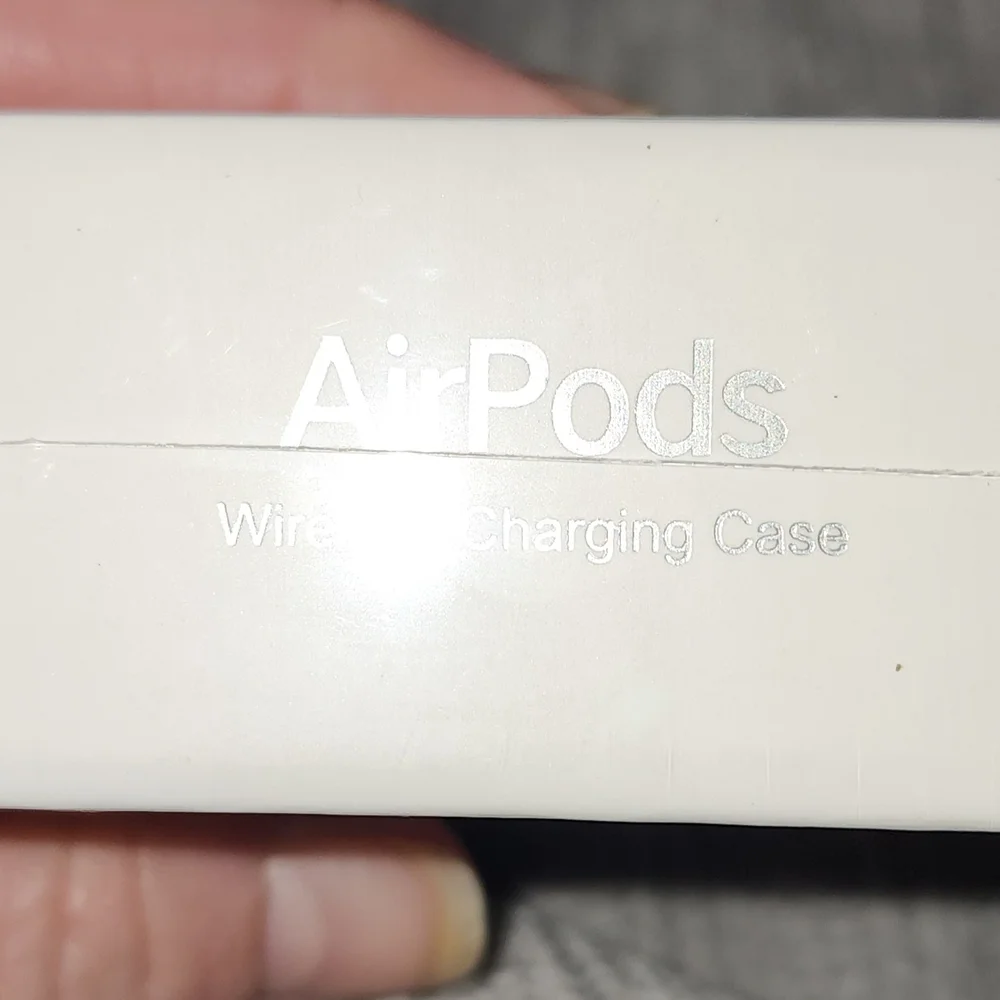 NWT AirPods With Wireless Charging Case White